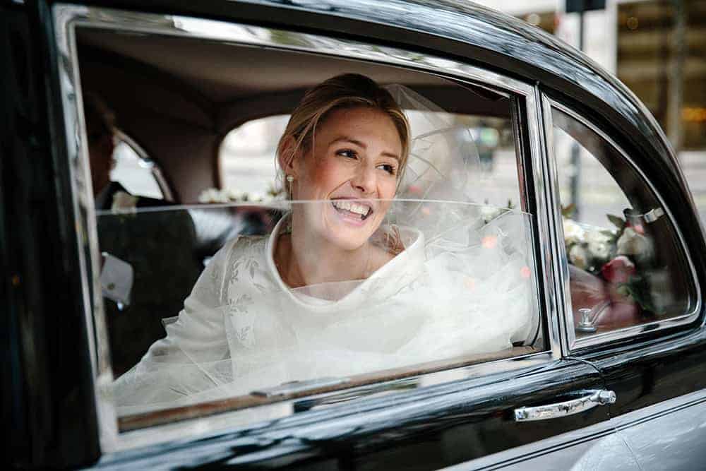 The bride in the car - Kent Wedding Photographer 